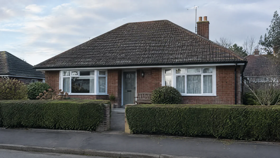 A British bungalow with a neat garden on a quiet street